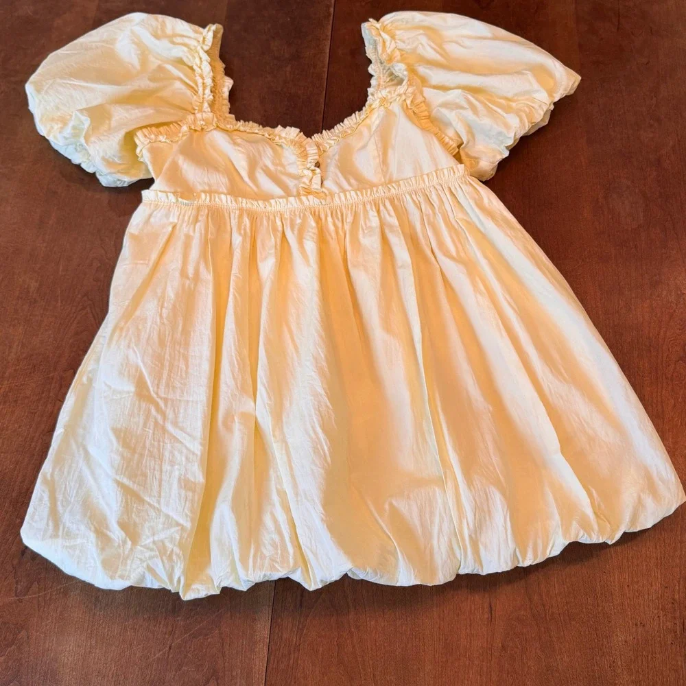 Free People Top Womens M Yellow Bubble Hem Babydoll Puff Sleeve Ruffle Smocked